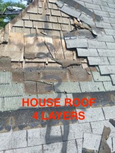 A house roof that has been damaged by the rain.