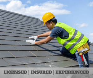 Roofer working on a tiled roof.