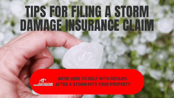 Hand holding hailstone, storm insurance claim tips.